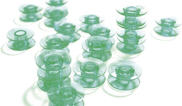 Green plastic bobbins 10-Pack